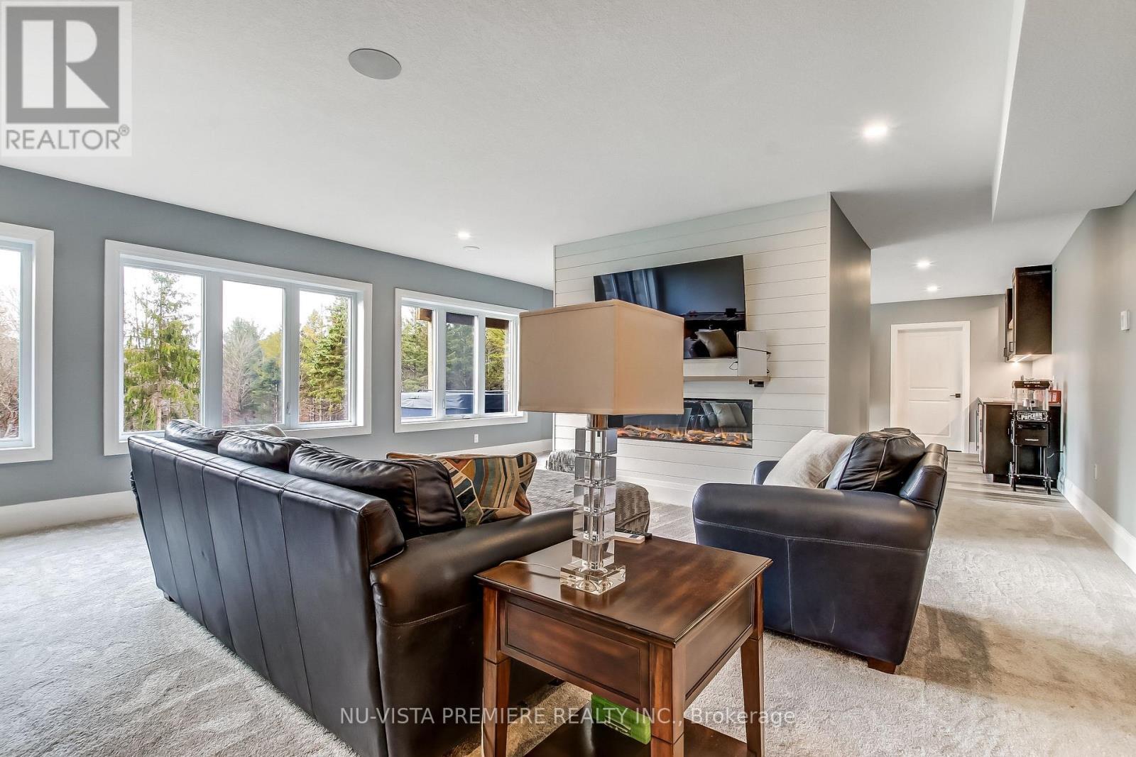 5233 Line 2 Line, Perth South (Blanshard), ON - Indoor Photo Showing Living Room With Fireplace