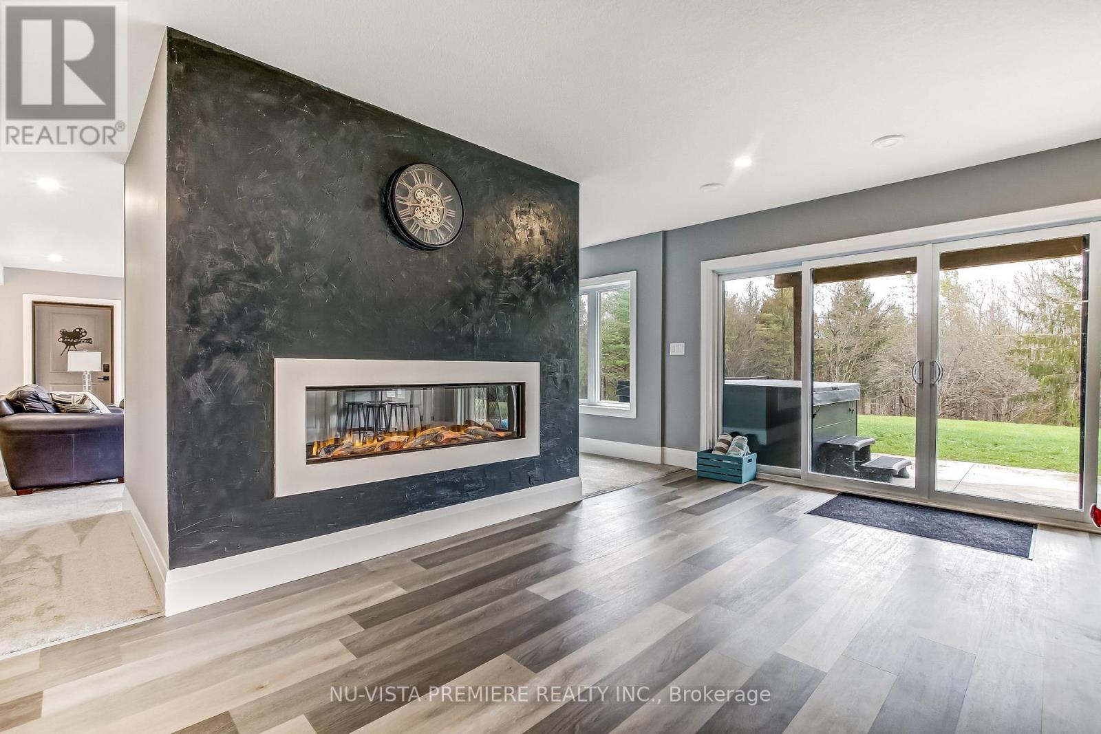 5233 Line 2 Line, Perth South (Blanshard), ON - Indoor Photo Showing Living Room With Fireplace