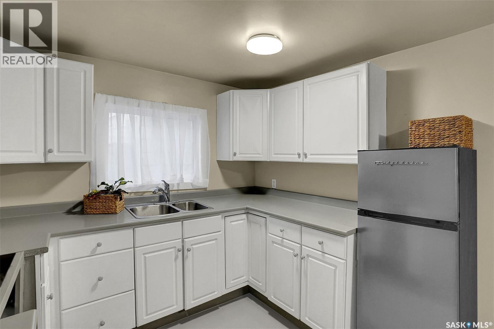 2234 Winnipeg Street, Regina, SK - Indoor Photo Showing Kitchen With Double Sink