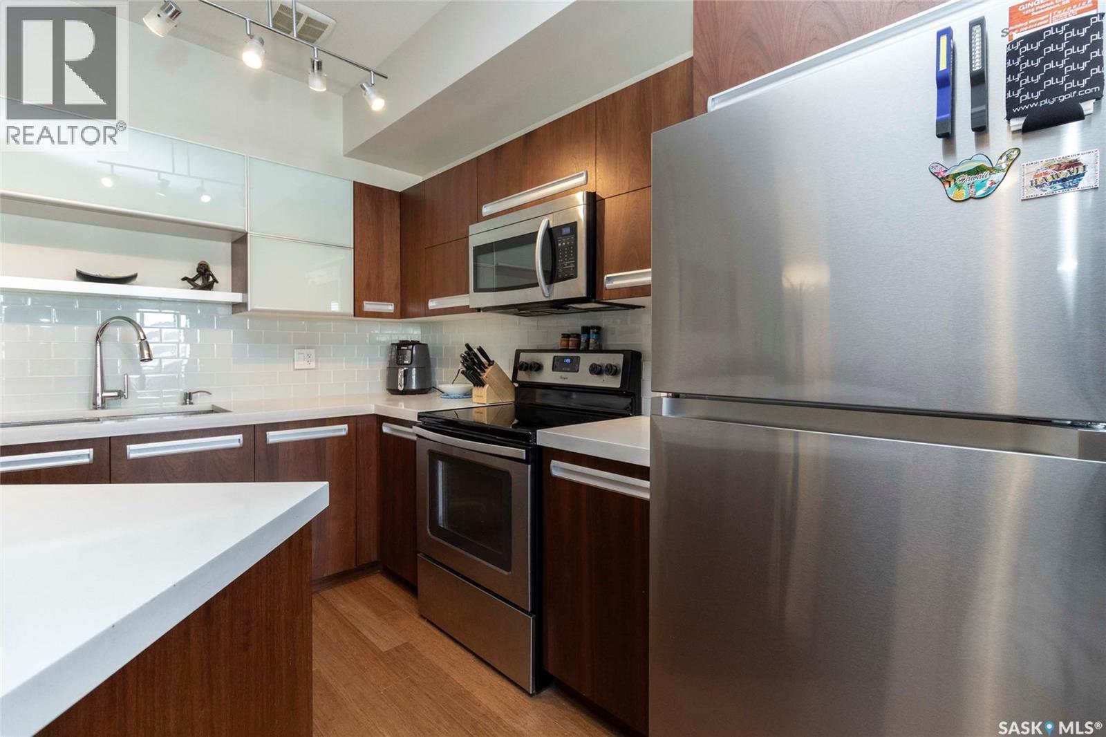 2208 1015 Patrick Crescent, Saskatoon, SK - Indoor Photo Showing Kitchen With Double Sink With Upgraded Kitchen