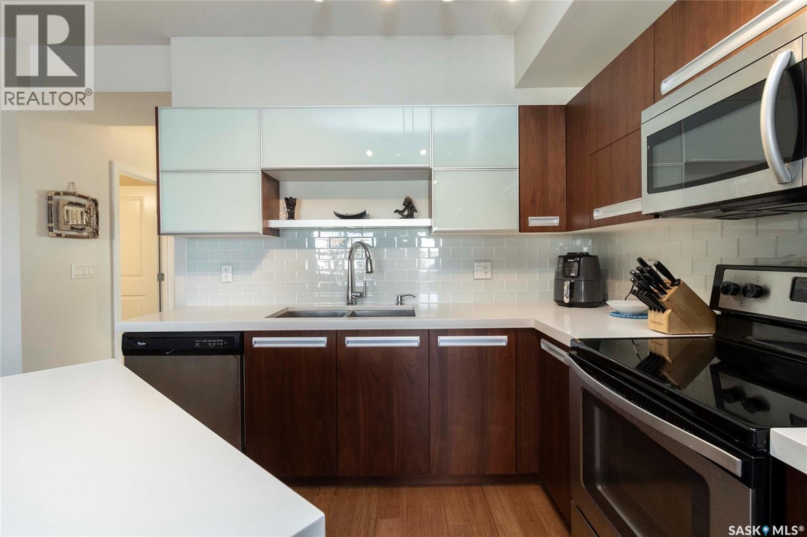2208 1015 Patrick Crescent, Saskatoon, SK - Indoor Photo Showing Kitchen With Double Sink With Upgraded Kitchen