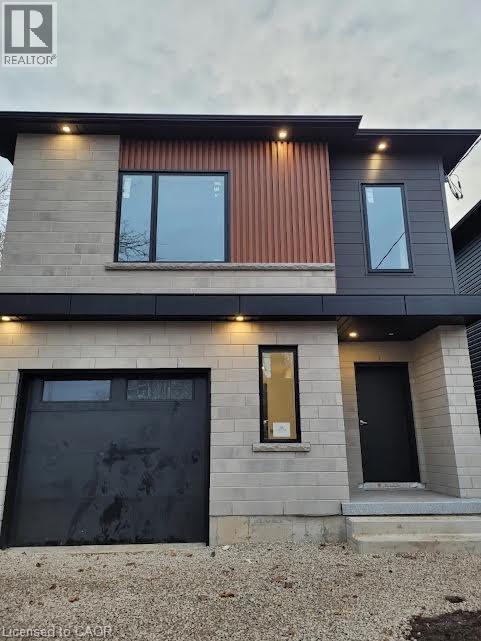 Modern home with an attached garage - 269 Dumfries Avenue Unit# Main, Kitchener, ON - Outdoor With Exterior
