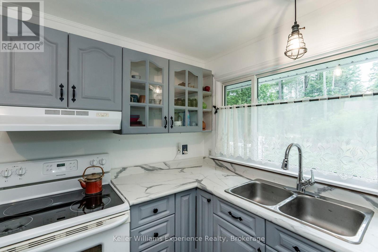 9 Harras Avenue, Tiny, ON - Indoor Photo Showing Kitchen With Double Sink