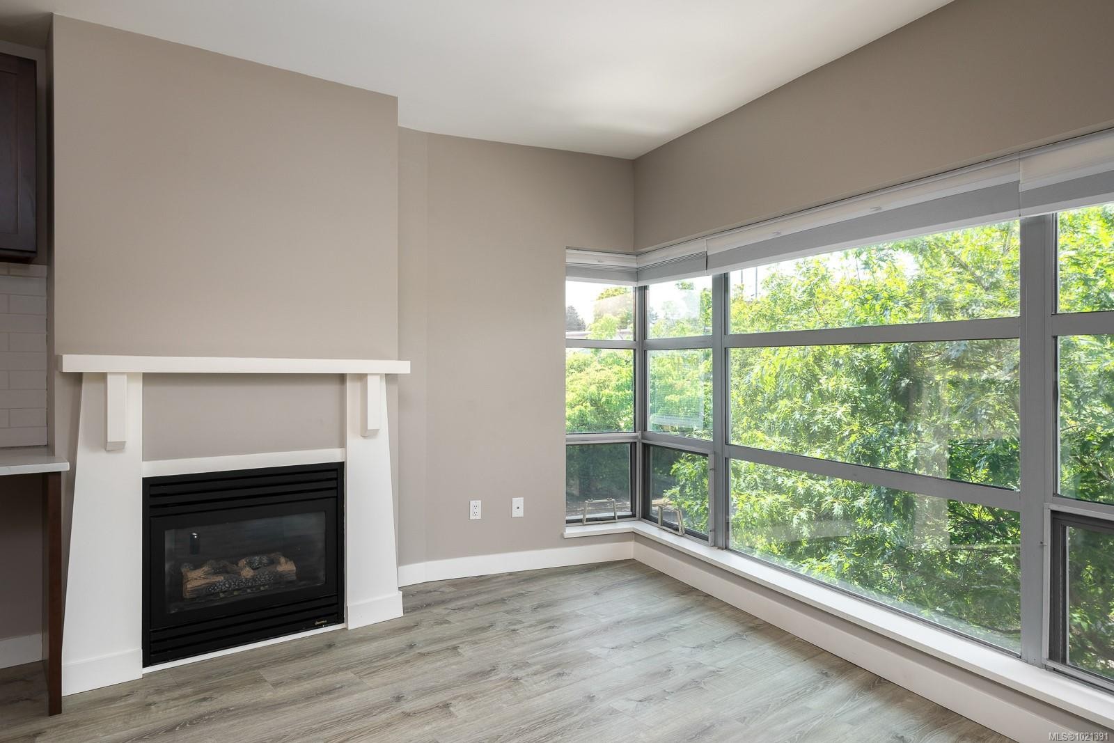 417-90 Regatta Landing, Victoria, BC - Indoor Photo Showing Other Room With Fireplace
