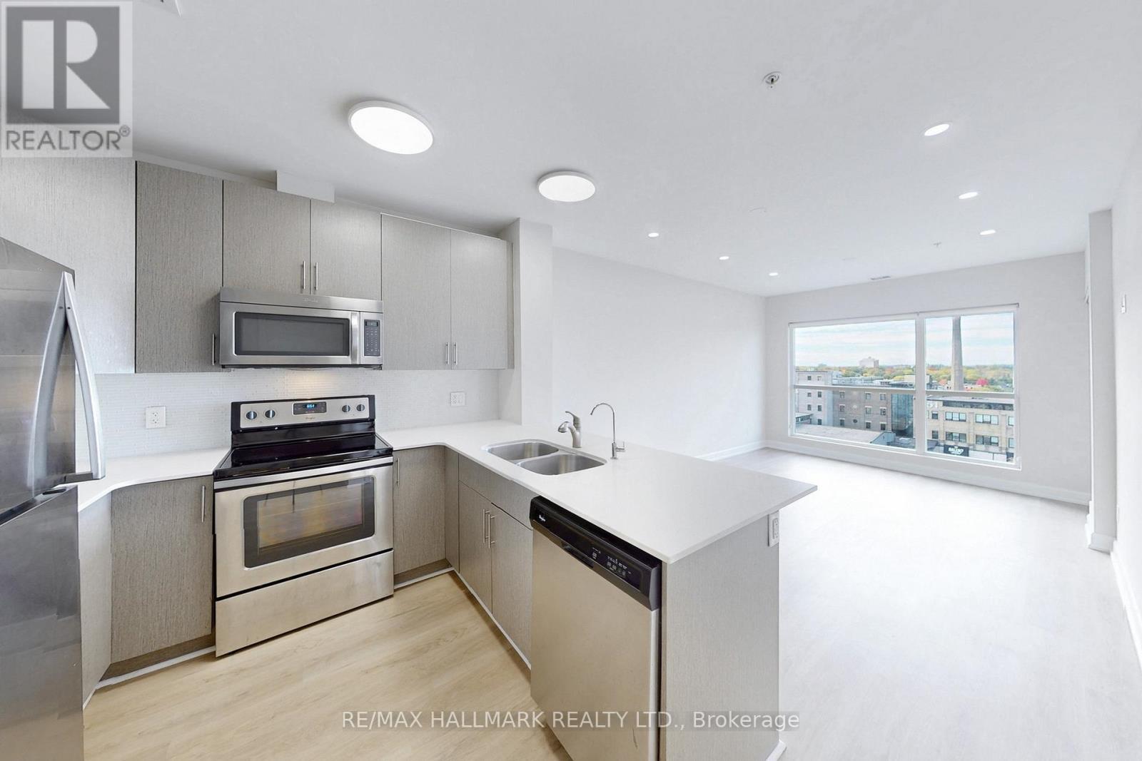 711 - 1 Victoria Street S, Waterloo, ON - Indoor Photo Showing Kitchen With Stainless Steel Kitchen With Double Sink