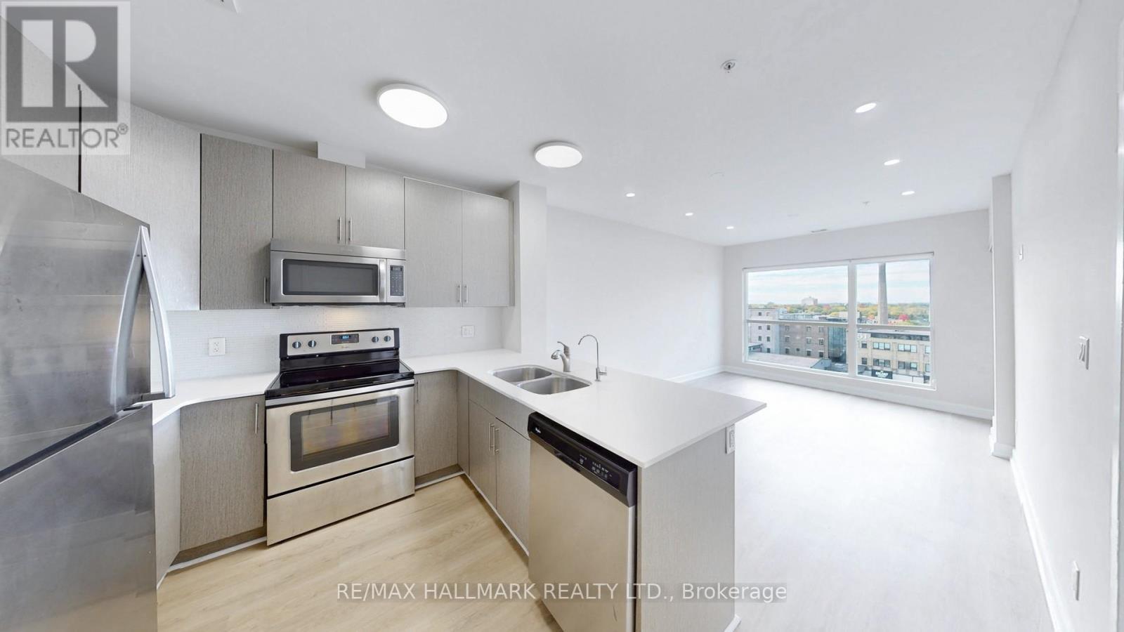 711 - 1 Victoria Street S, Waterloo, ON - Indoor Photo Showing Kitchen With Stainless Steel Kitchen With Double Sink