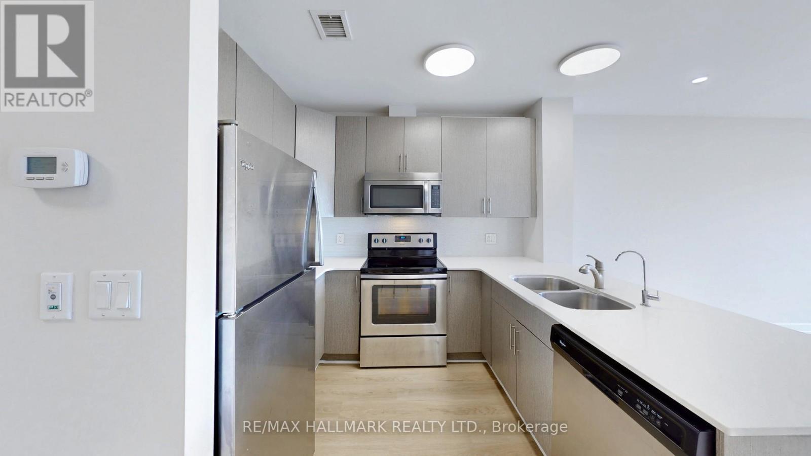 711 - 1 Victoria Street S, Waterloo, ON - Indoor Photo Showing Kitchen With Stainless Steel Kitchen With Double Sink