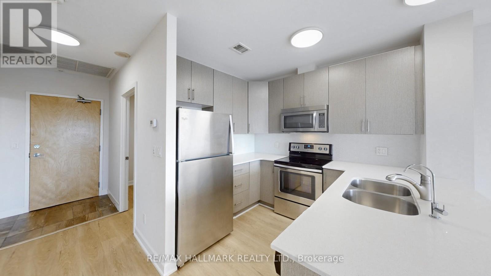 711 - 1 Victoria Street S, Waterloo, ON - Indoor Photo Showing Kitchen With Stainless Steel Kitchen With Double Sink