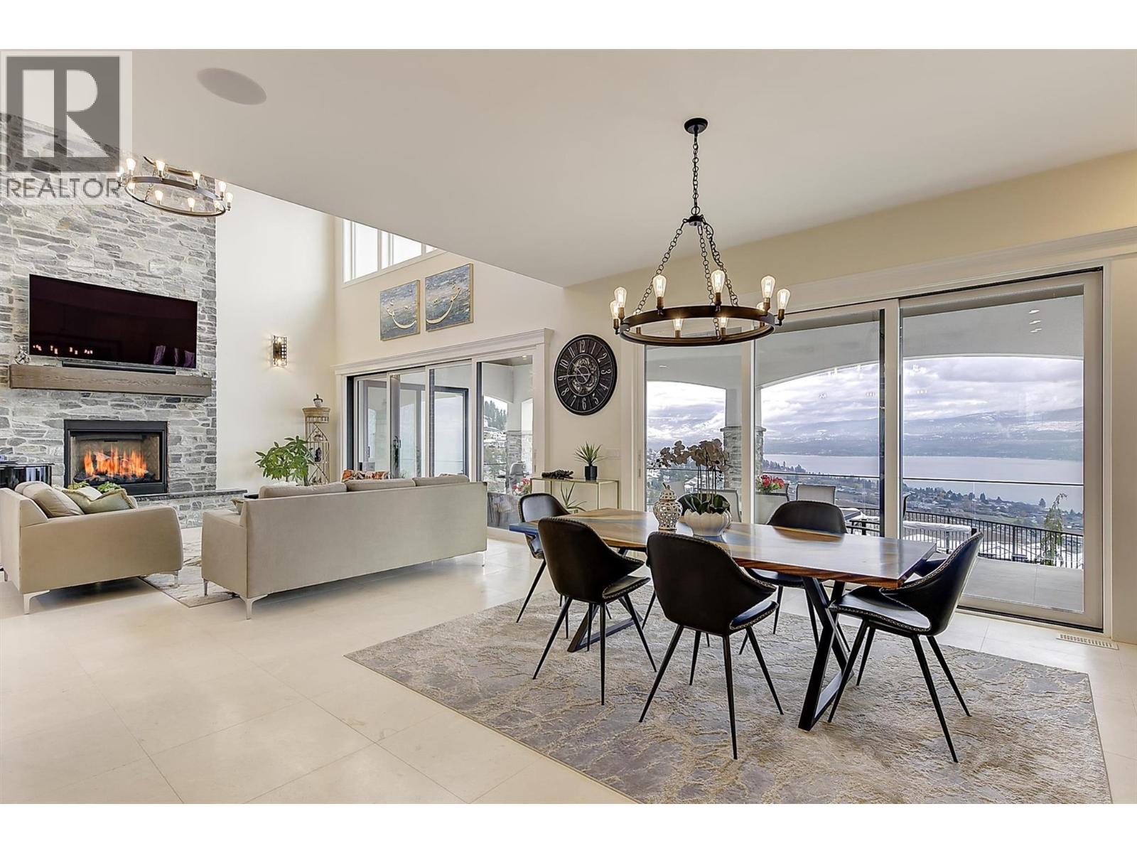 3279 Vineyard View Drive, West Kelowna, BC - Indoor Photo Showing Dining Room With Fireplace