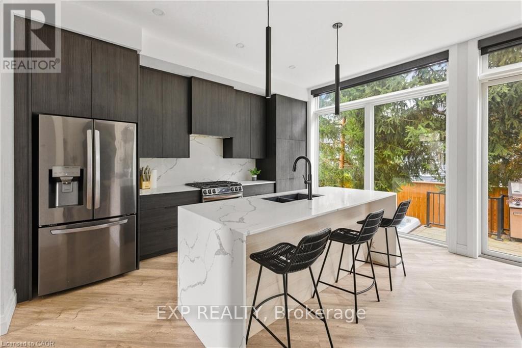 26 Huron Street, Lambton Shores, ON - Indoor Photo Showing Kitchen With Stainless Steel Kitchen With Double Sink With Upgraded Kitchen