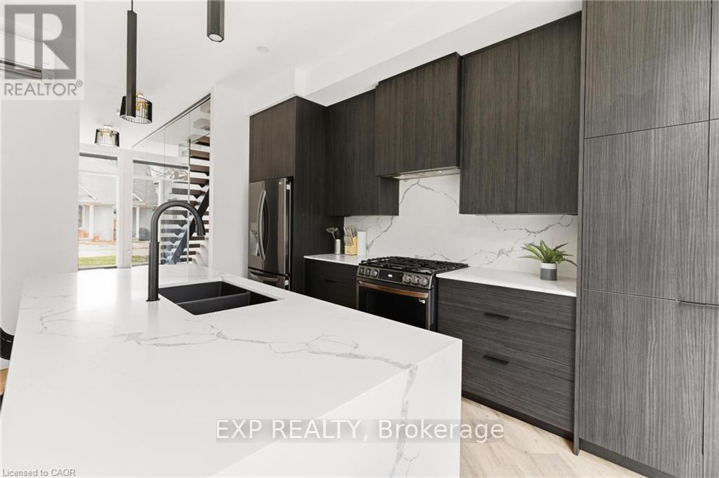 26 Huron Street, Lambton Shores, ON - Indoor Photo Showing Kitchen With Double Sink