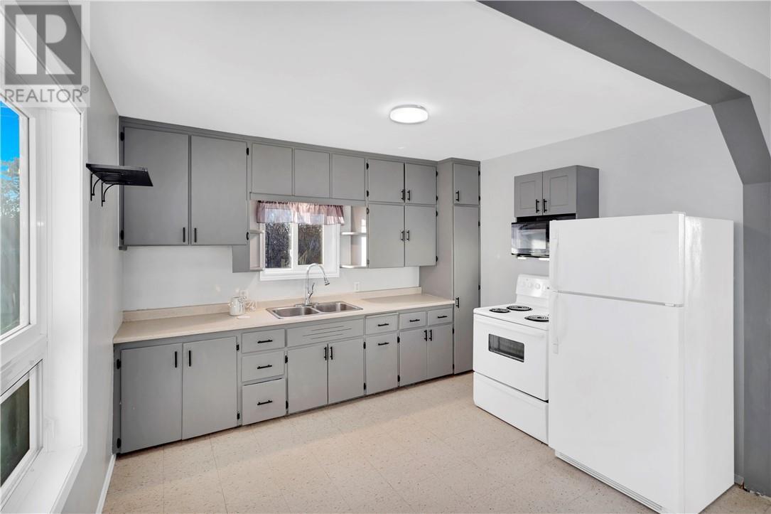 165 Cedar Street, Massey, ON - Indoor Photo Showing Kitchen With Double Sink