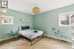 Bedroom featuring light wood-type flooring -