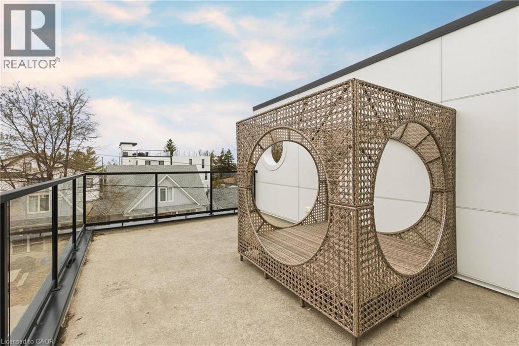 Gate with a balcony - 26 Huron Street, Grand Bend, ON - Outdoor With Balcony With Exterior