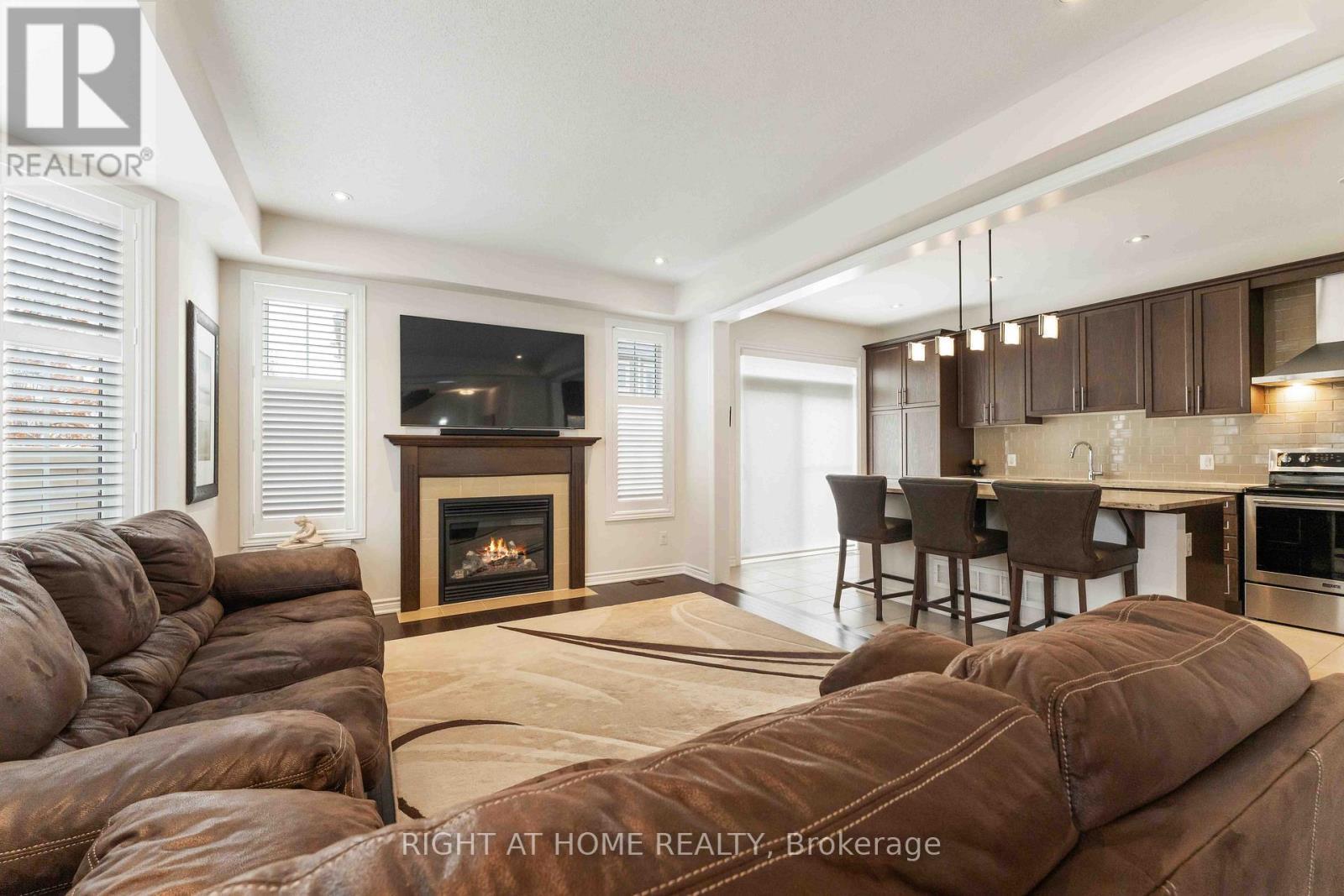 369 Autumnfield Street, Ottawa, ON - Indoor Photo Showing Living Room With Fireplace