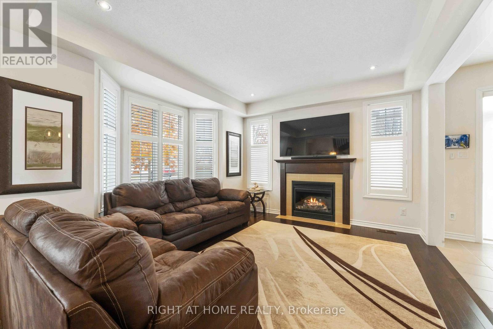 369 Autumnfield Street, Ottawa, ON - Indoor Photo Showing Living Room With Fireplace