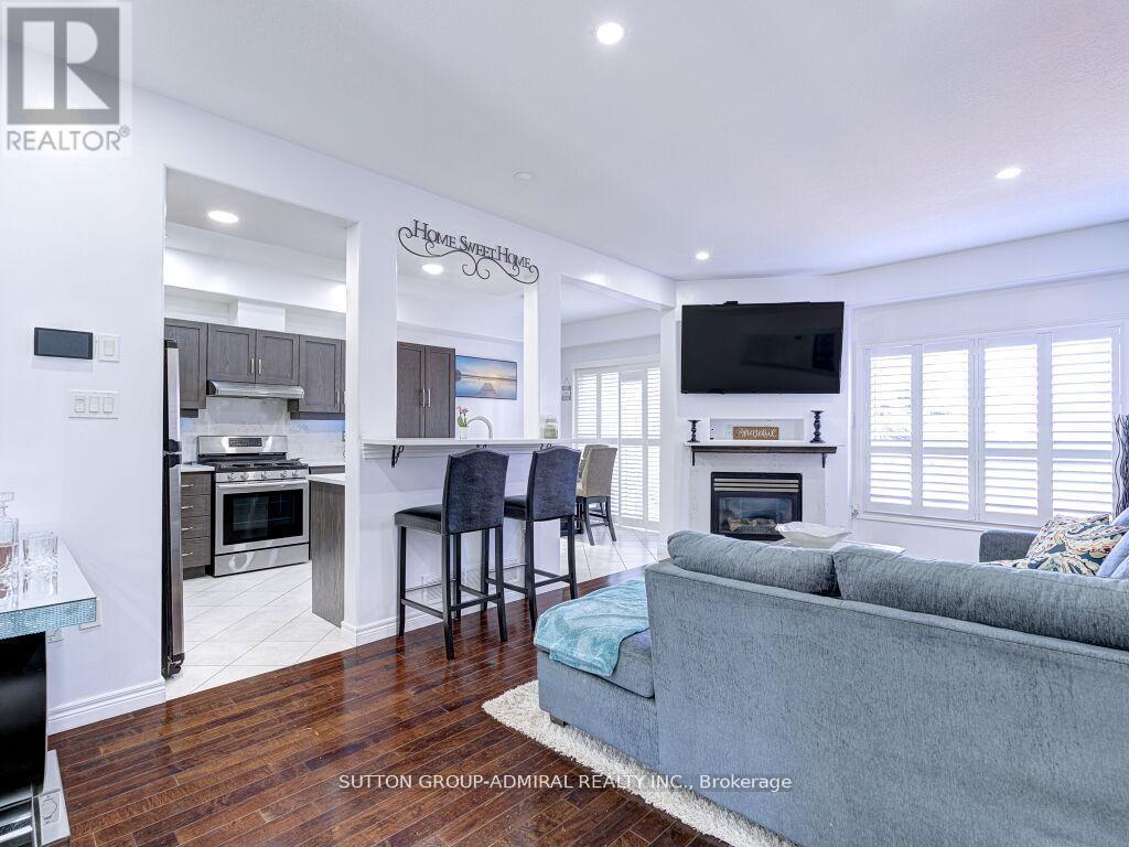 31 Palacebeach Trail, Hamilton, ON - Indoor Photo Showing Living Room With Fireplace
