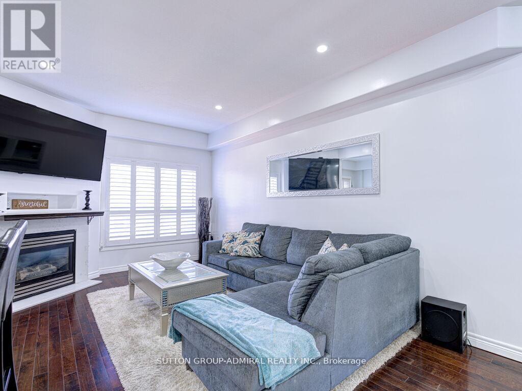 31 Palacebeach Trail, Hamilton, ON - Indoor Photo Showing Living Room With Fireplace