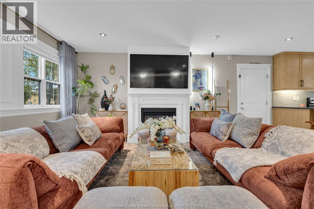 8475 Wyandotte Unit# 116, Windsor, ON - Indoor Photo Showing Living Room With Fireplace