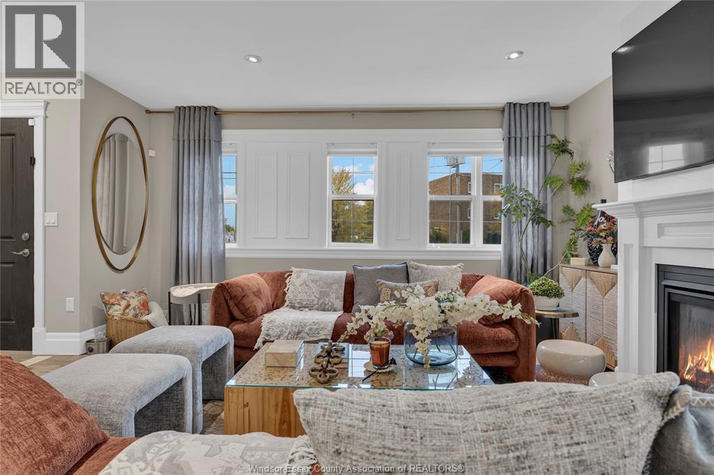8475 Wyandotte Unit# 116, Windsor, ON - Indoor Photo Showing Living Room With Fireplace
