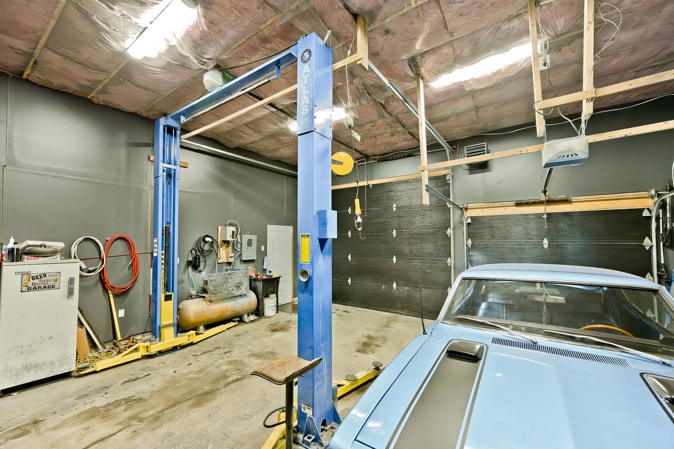 Garage - 15 Ch. Armand-Martineau, Saint-Herménégilde, QC - Indoor Photo Showing Garage