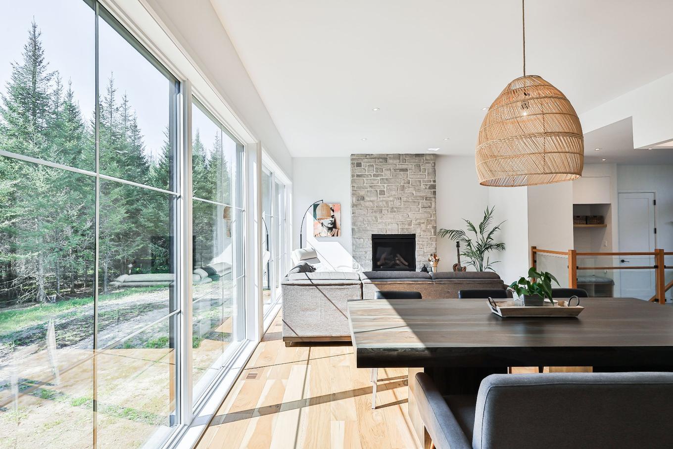 Dining room - 1104 Ch. Du Massif, Piedmont, QC - Indoor With Fireplace