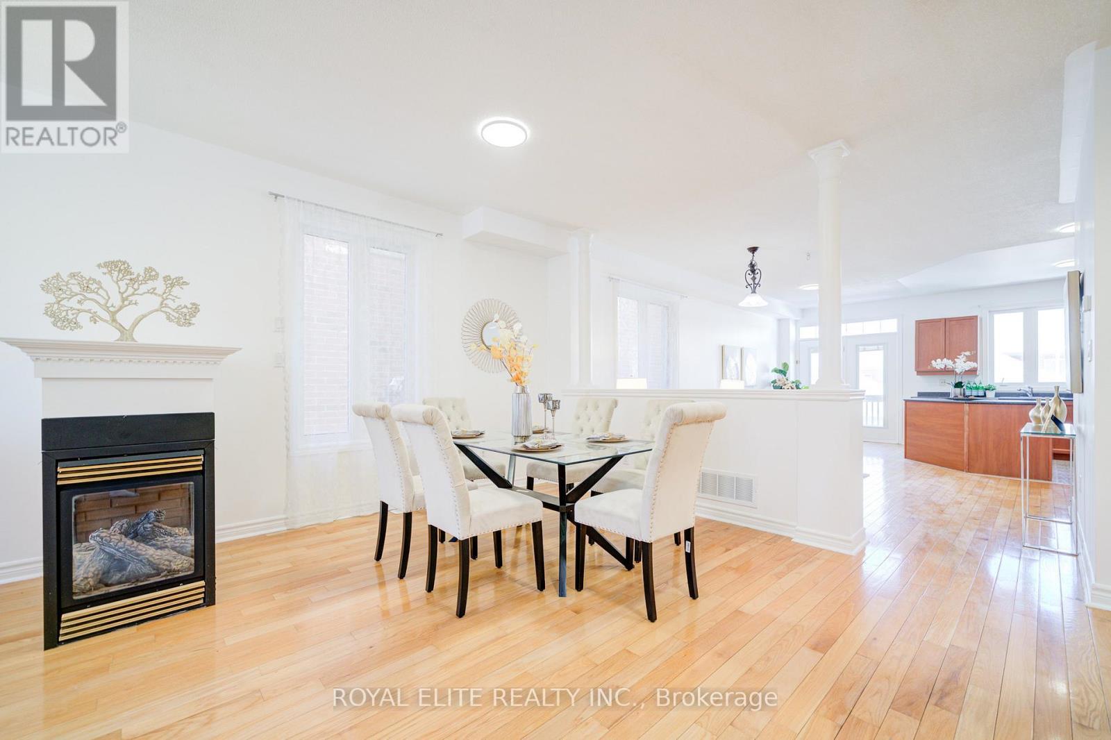 358 William Berczy Boulevard, Markham, ON - Indoor Photo Showing Dining Room With Fireplace