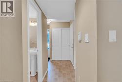 Hallway featuring baseboards -