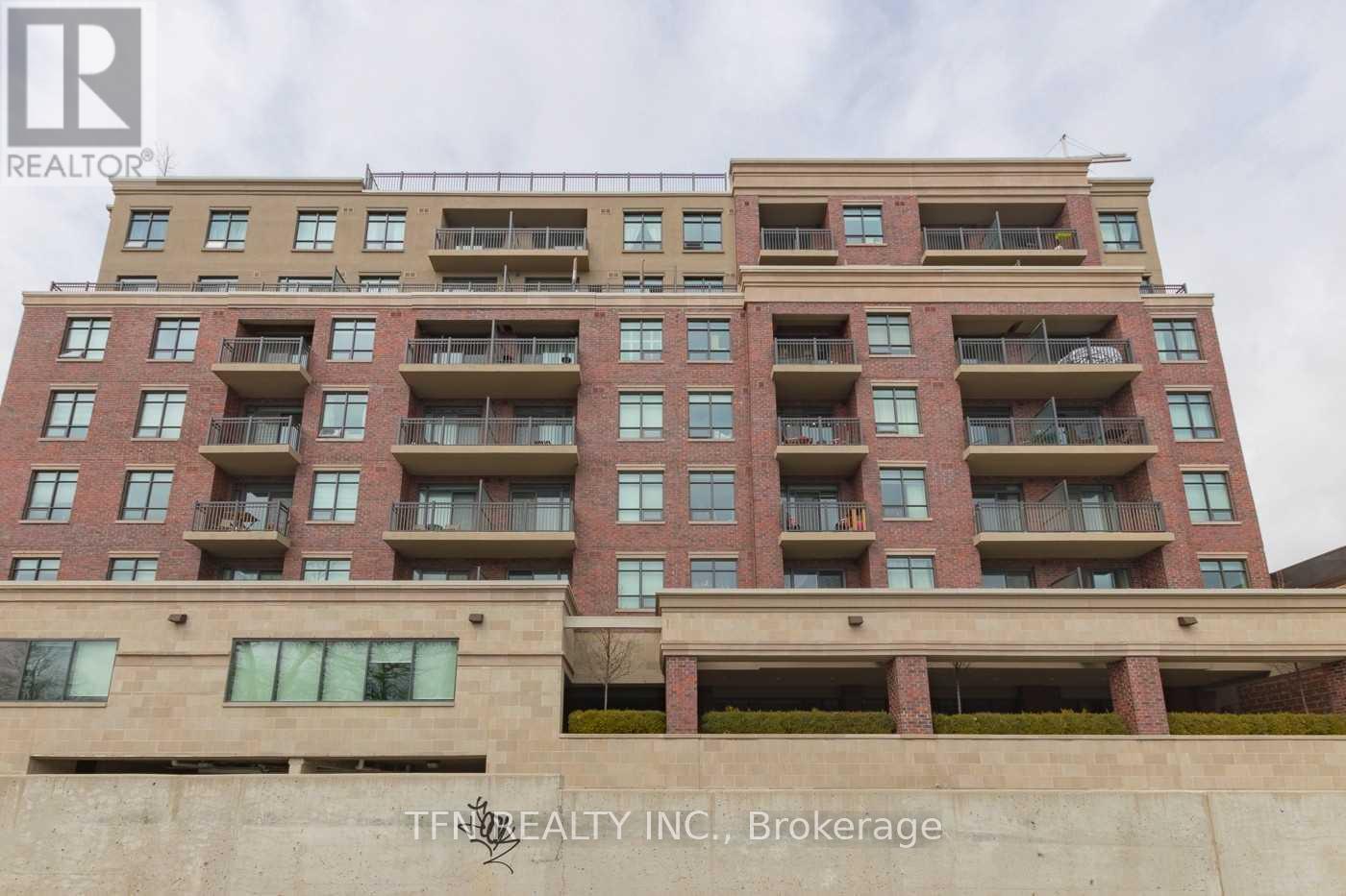 411 - 3563 Lake Shore Boulevard W, Toronto, ON - Outdoor With Balcony With Facade