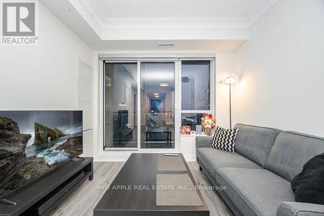 1207 - 18 Water Walk Drive, Markham, ON - Indoor Photo Showing Living Room With Fireplace