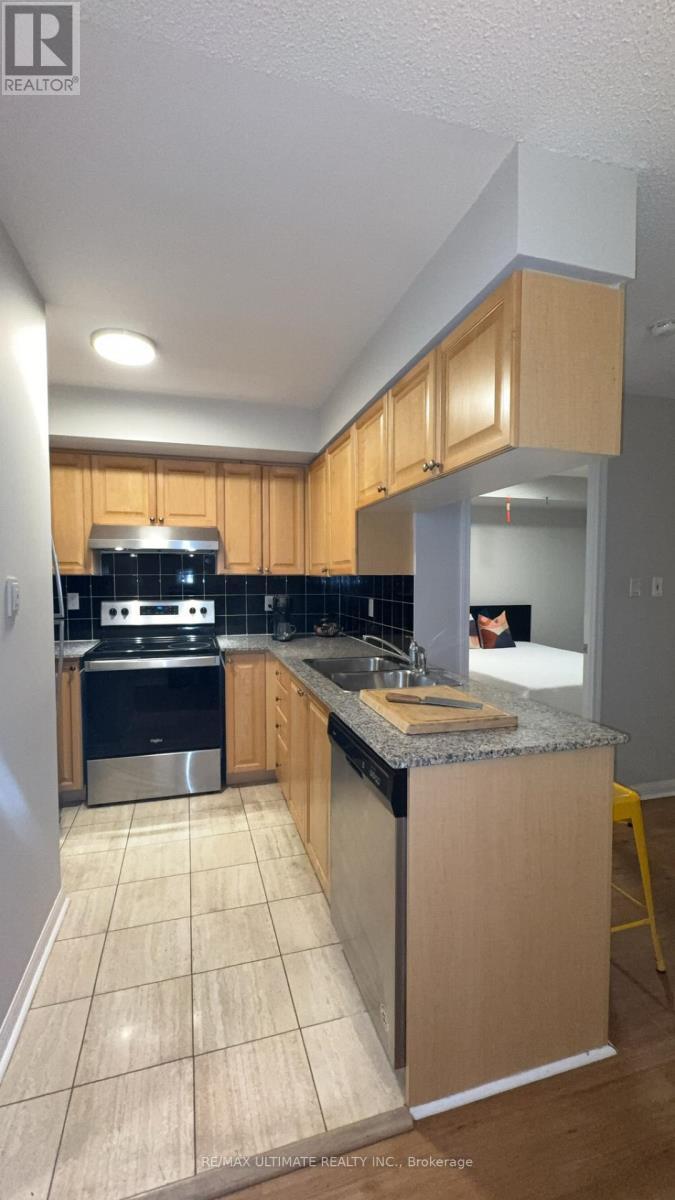 720 - 230 Queens Quay W, Toronto, ON - Indoor Photo Showing Kitchen With Double Sink