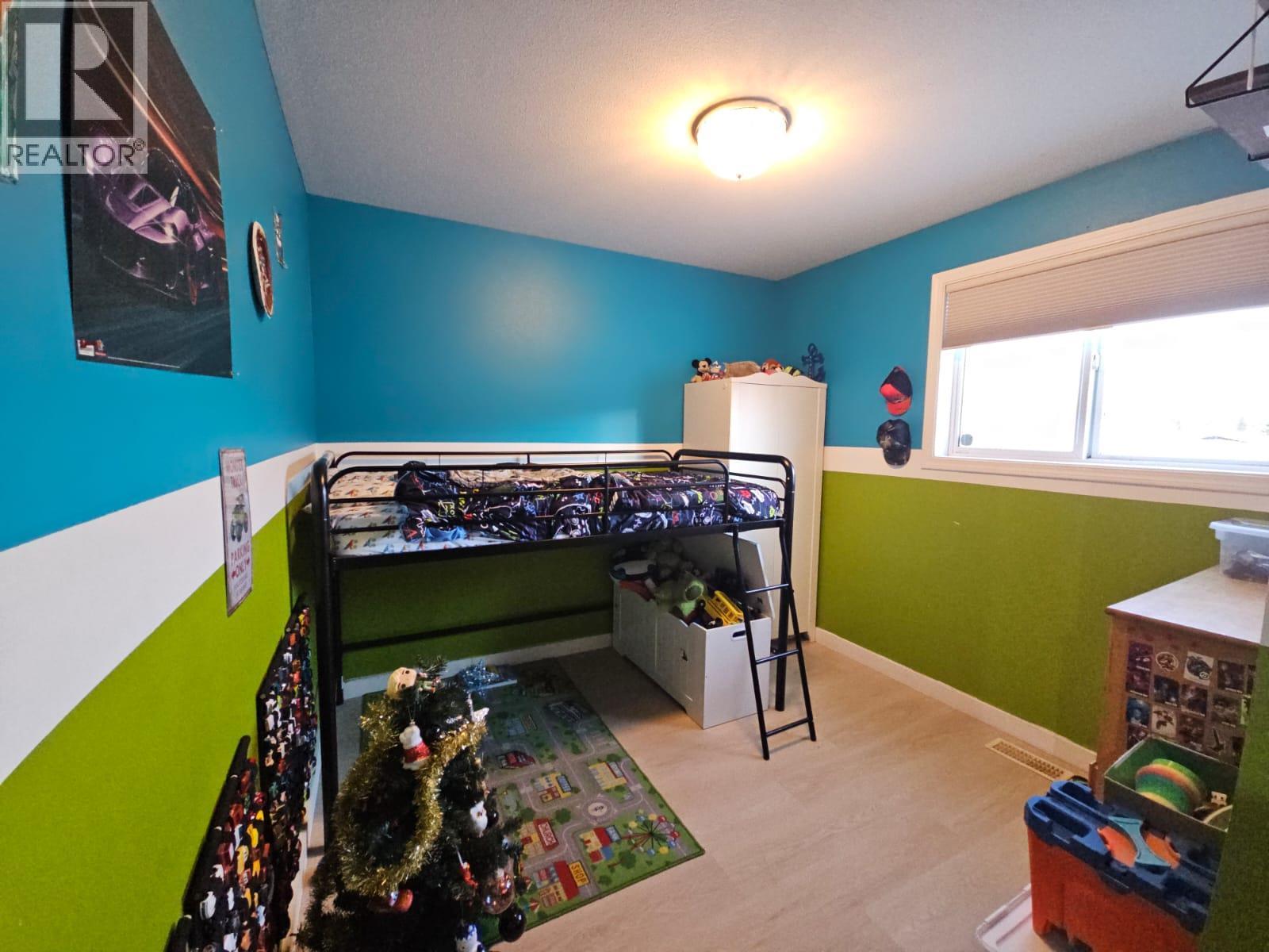 5200 41 Street Ne, Chetwynd, BC - Indoor Photo Showing Bedroom