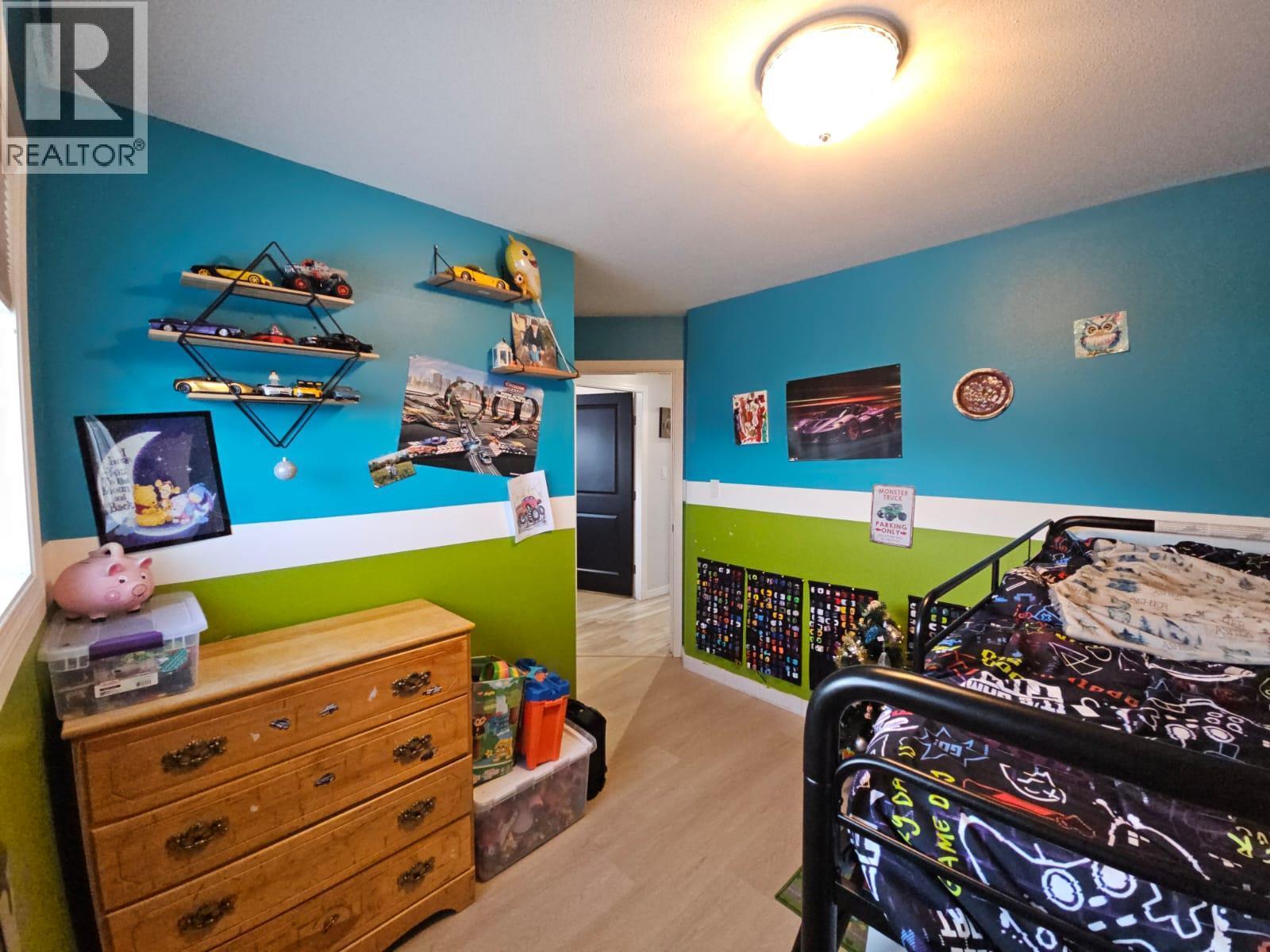 5200 41 Street Ne, Chetwynd, BC - Indoor Photo Showing Bedroom