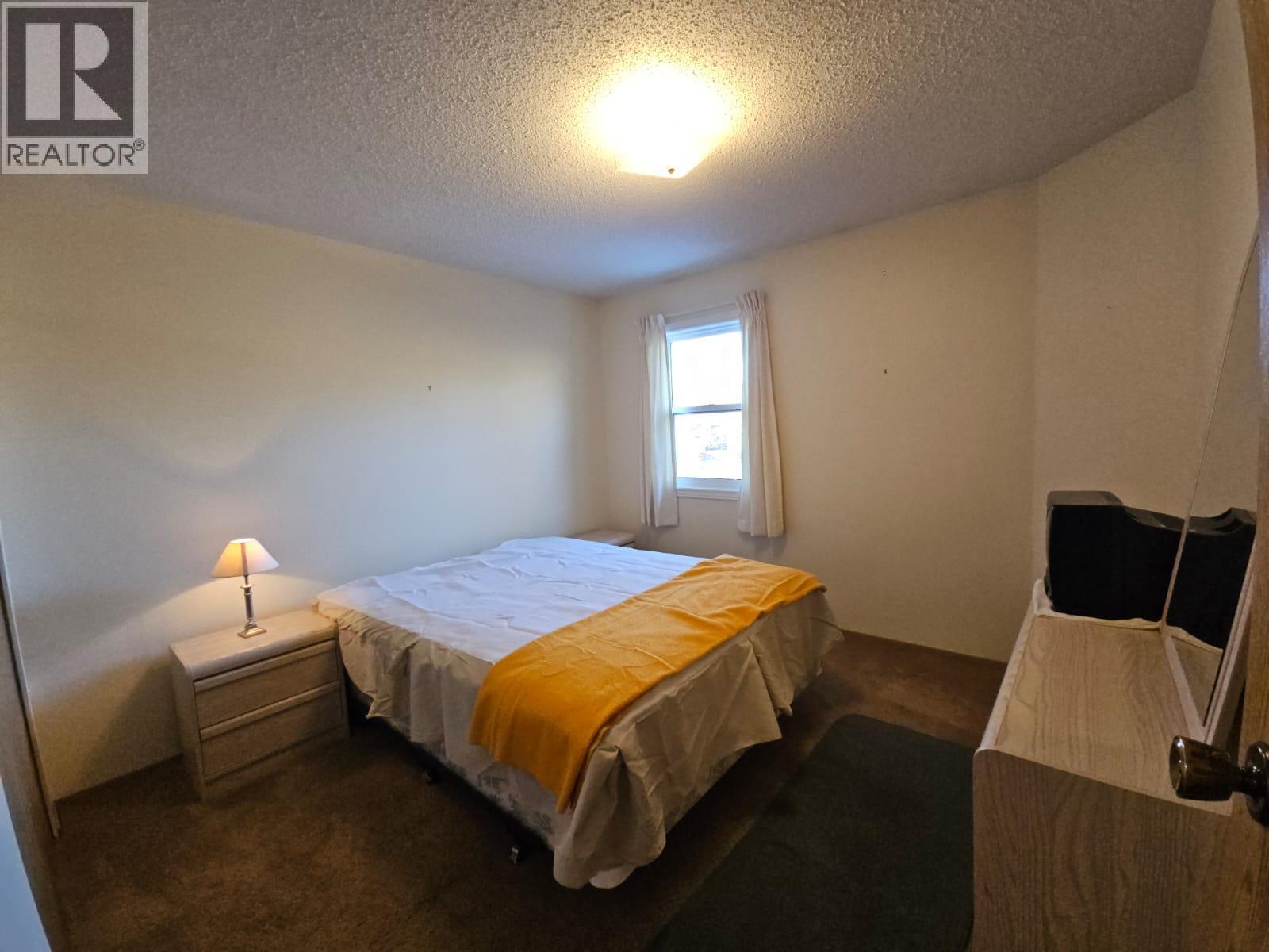 307-195 Chamberlain Crescent, Tumbler Ridge, BC - Indoor Photo Showing Bedroom