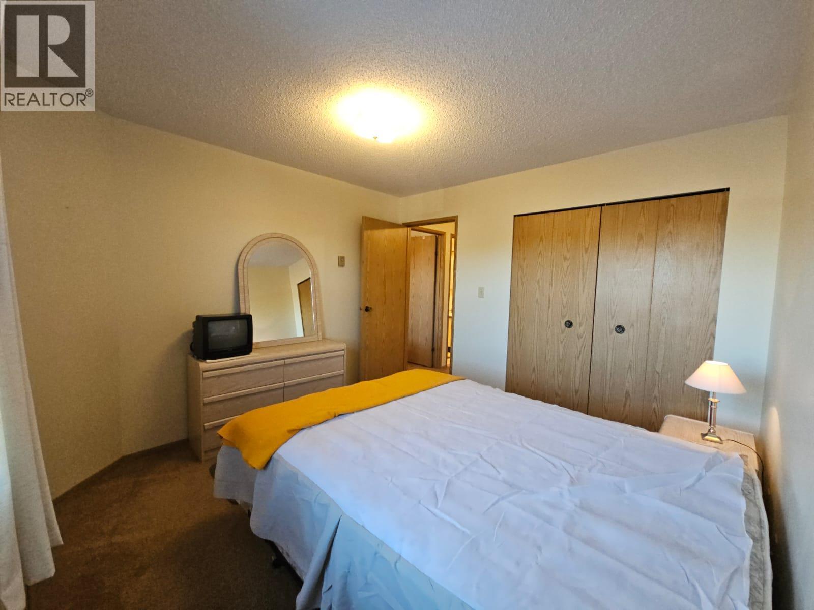 307-195 Chamberlain Crescent, Tumbler Ridge, BC - Indoor Photo Showing Bedroom