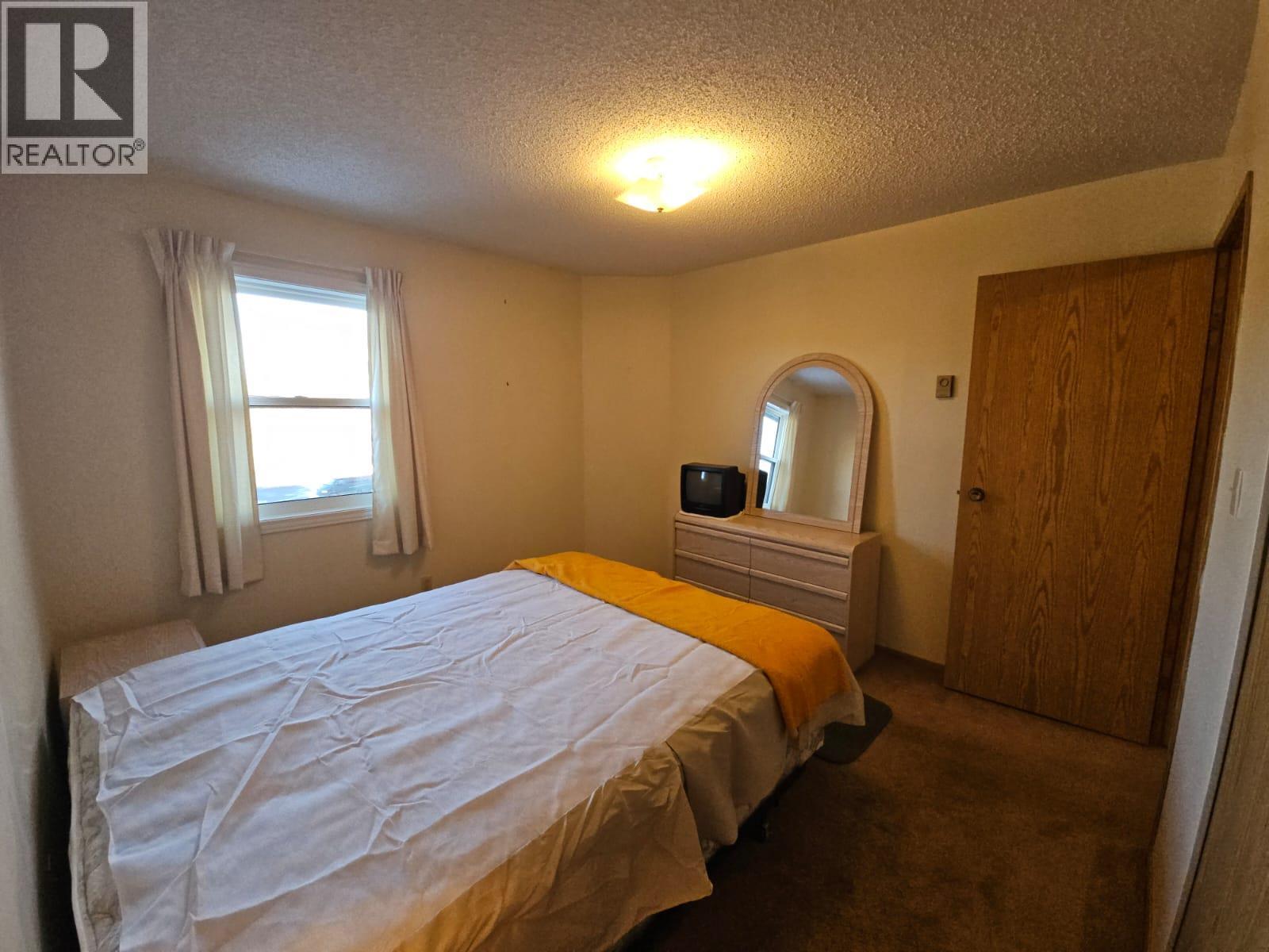 307-195 Chamberlain Crescent, Tumbler Ridge, BC - Indoor Photo Showing Bedroom
