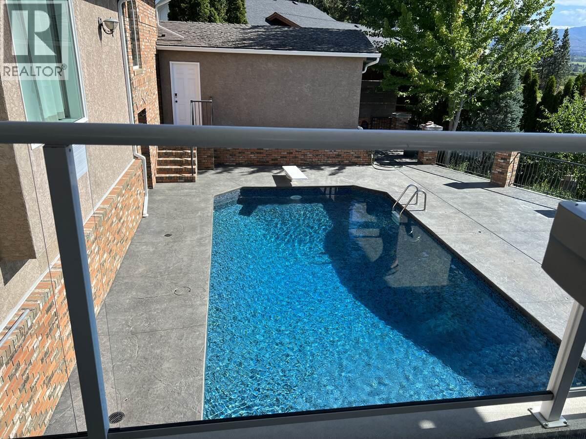 3380 Neid Road, Kelowna, BC - Outdoor With In Ground Pool