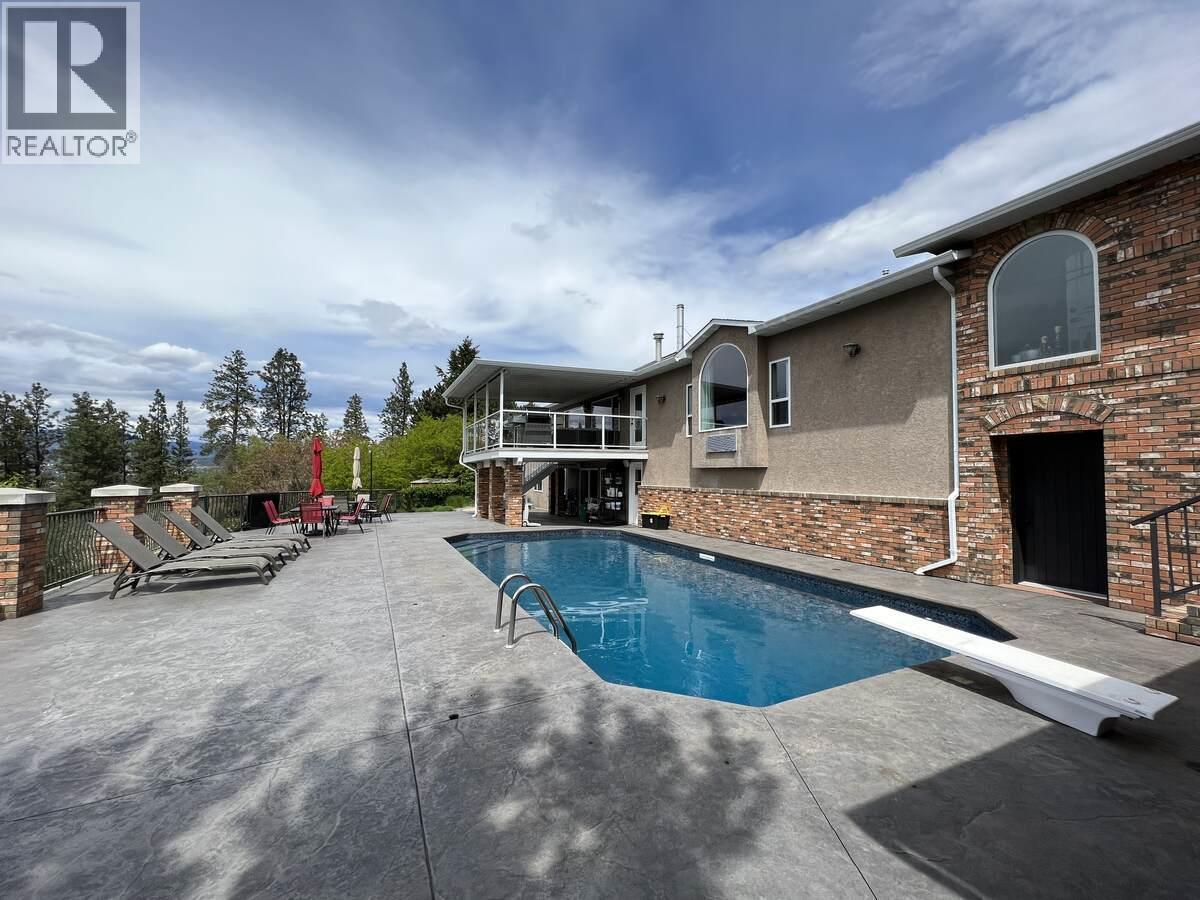 3380 Neid Road, Kelowna, BC - Outdoor With In Ground Pool