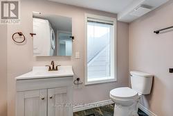 Bath 2 - 3 piece with stacked laundry -