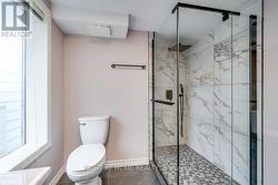 Bath 2 - 3 piece with stacked laundry -