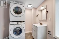 Bath 2 - 3 piece with stacked laundry -