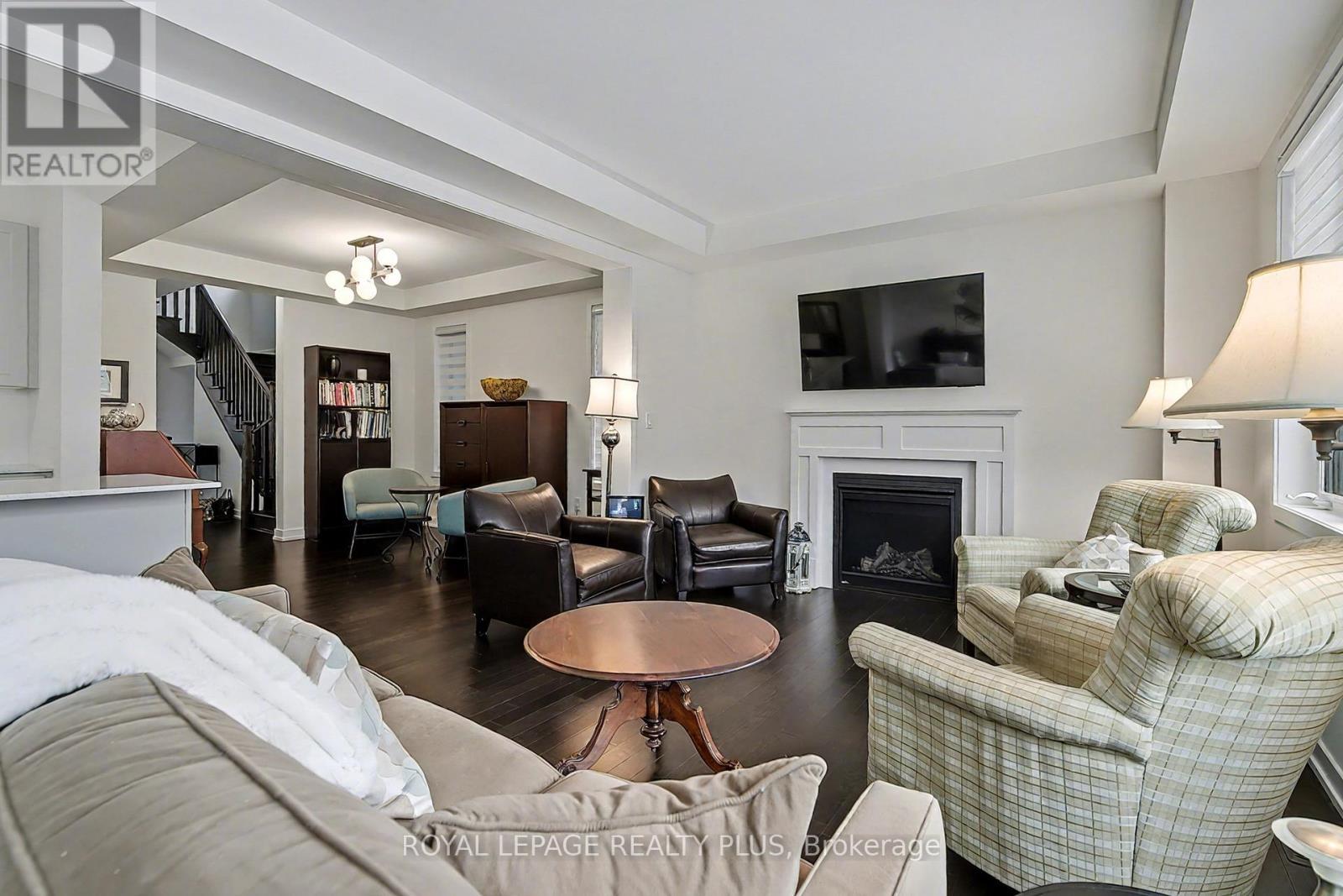 Tasteful and modern - 24 Ferguson Street, Erin, ON - Indoor Photo Showing Living Room With Fireplace