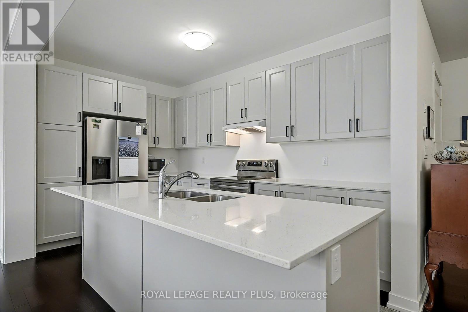 Open modern kitchen; S/S appliances - 24 Ferguson Street, Erin, ON - Indoor Photo Showing Kitchen With Stainless Steel Kitchen With Double Sink