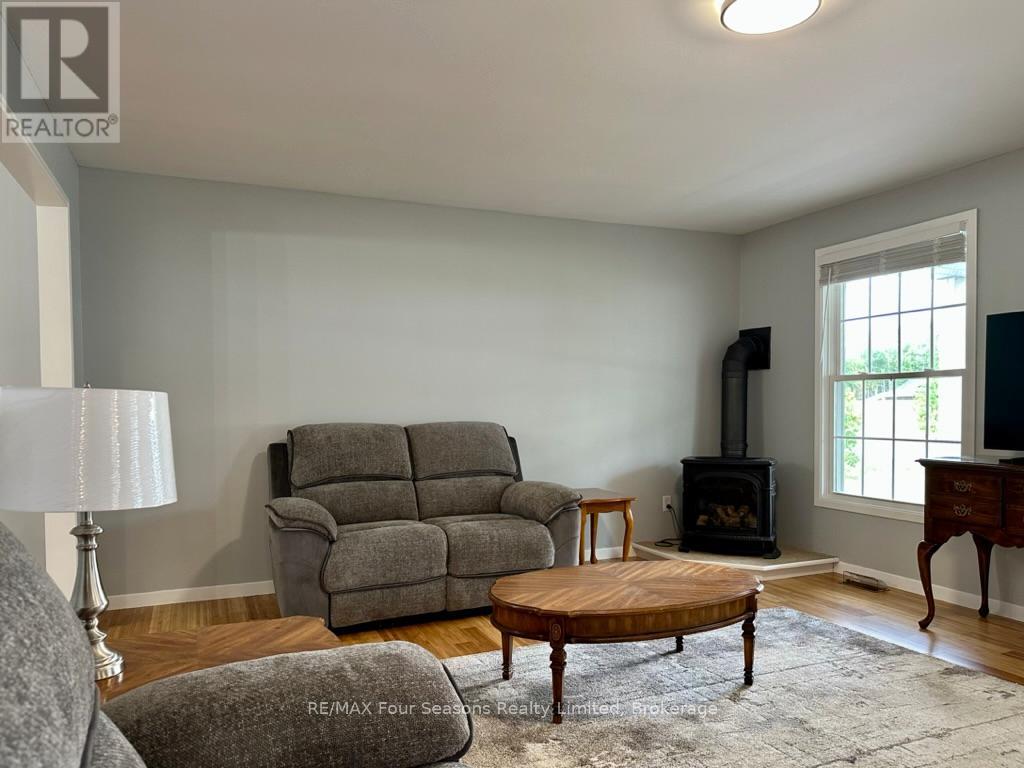 207 Christopher Street, Clearview (Stayner), ON - Indoor Photo Showing Living Room With Fireplace