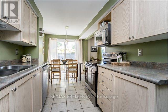105 Courtney Crescent, Barrie, ON - Indoor Photo Showing Kitchen With Double Sink