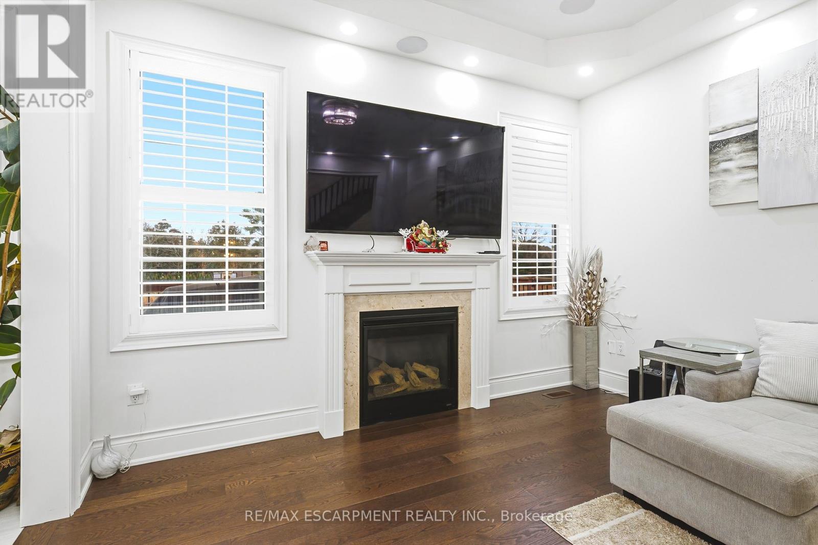 60 Golden Hawk Drive, Hamilton, ON - Indoor With Fireplace