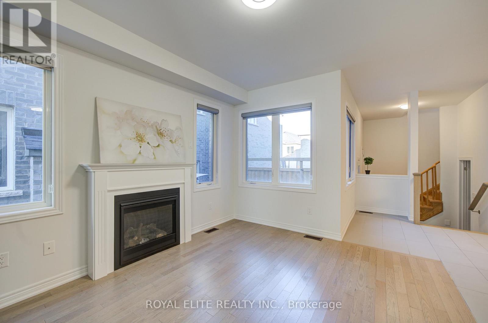 51 Albert Lewis Street, Markham, ON - Indoor Photo Showing Living Room With Fireplace