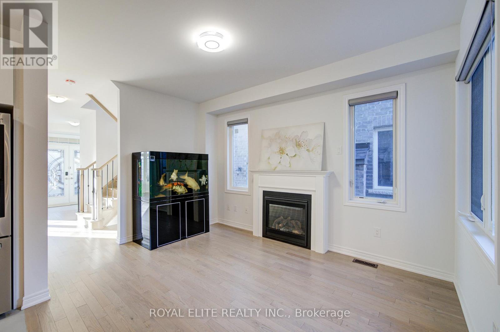 51 Albert Lewis Street, Markham, ON - Indoor Photo Showing Living Room With Fireplace