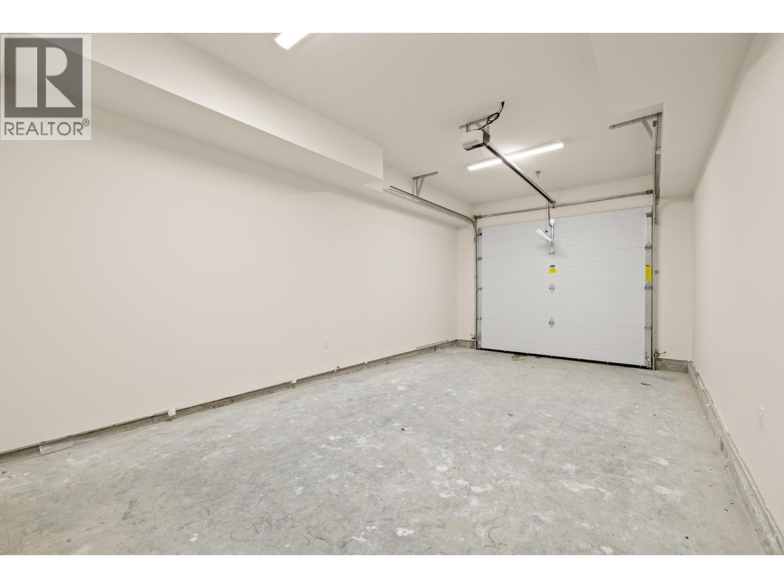 Garage #2 - 255 Feathertop Way Unit# 89, Big White, BC - Indoor Photo Showing Garage