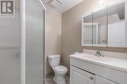 Unit 1 second bathroom Lower level -
